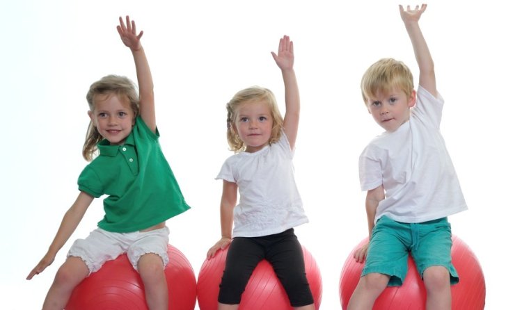 kids on exercise balls